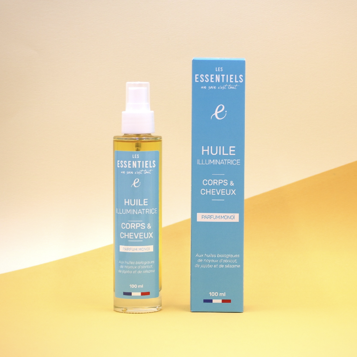 Flacon d’huile illuminatrice corps et cheveux parfum monoï 100ml, finition brillante.