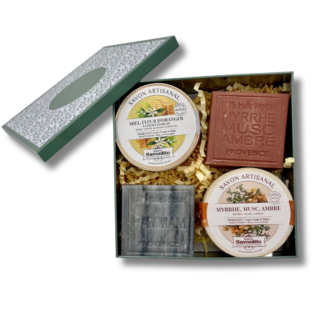 Coffret artisanal Orient & Douceur, voyage sensoriel entre miel et ambre présenté dans sa boîte en métal illustrée